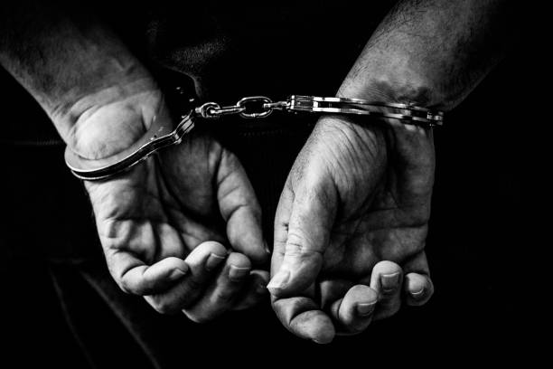 Arrested man - handcuffed