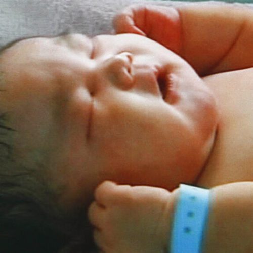In this image made on Saturday, Feb. 4, 2012, from CCTV television,  a 15-pound baby named Chun Chun,  sleeps at Xinxiang Maternity Hospital, in Xinxiang city, Henan province, China.  A mother in central China gave birth to the 15.52 pound (7.04 kilogram) baby on Saturday, possibly the largest newborn on record since the country's founding in 1949. (AP Photo/CCTV via APTN) TV OUT, CHINA OUT