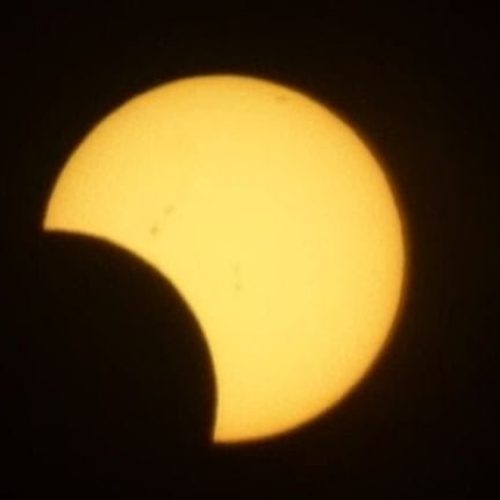 Las imágenes del Eclipse Parcial de Sol en San Juan